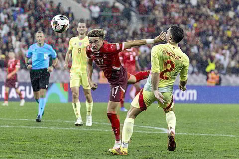 2024–25 UEFA Nations League, Switzerland vs Spain: Switzerland's midfielder Ruben Vargas, left, fights for the ball with Spain's defender Dani Carvajal